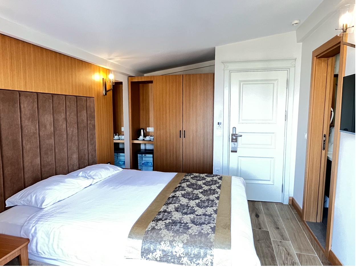 Balcony Sea View Room detail with window and furniture