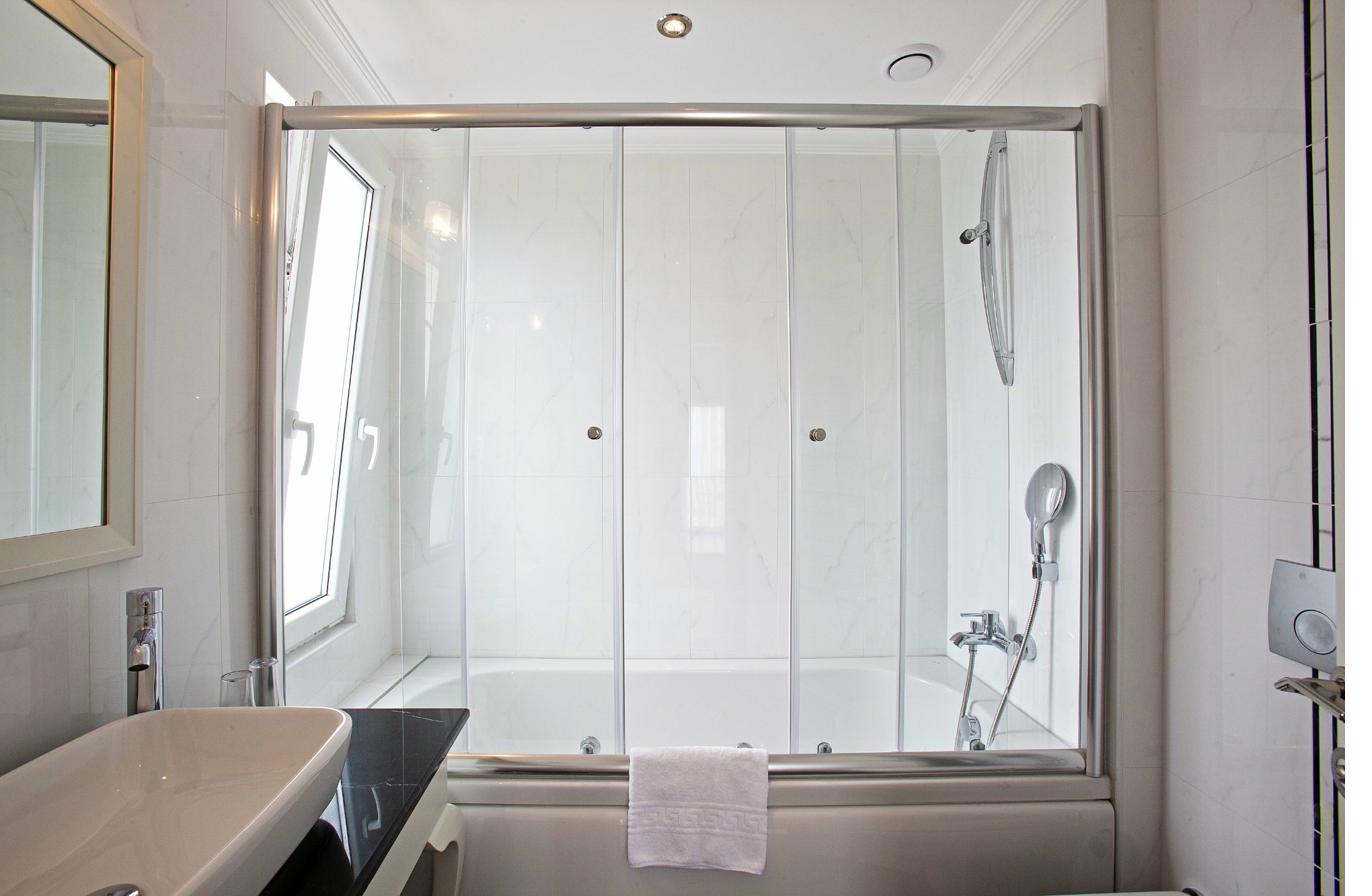 Superior Quadruple Room bathroom vanity with mirror