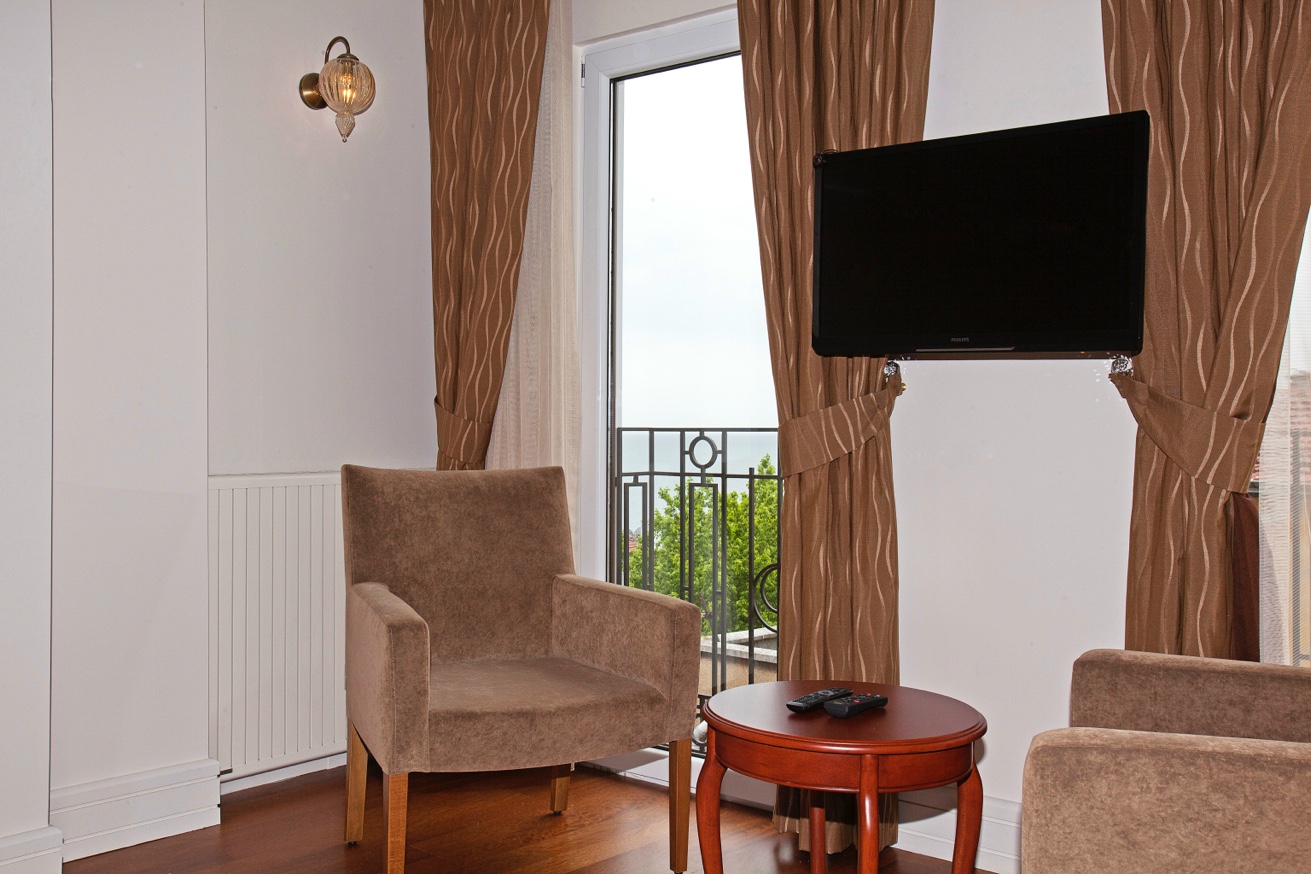 Superior Sea View Room detail with window and furniture