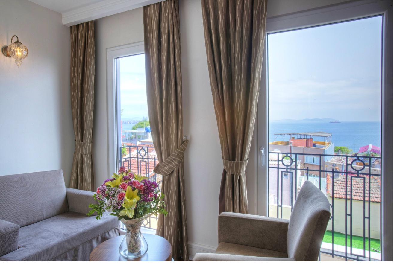 Superior Sea View Room evening ambiance with warm lighting