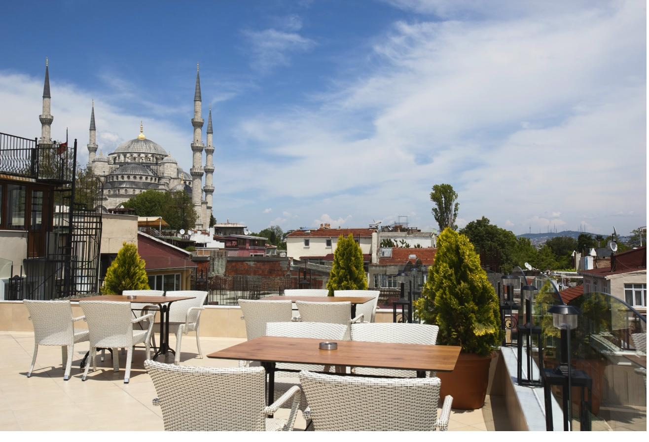 Rooftop terrace with Blue Mosque view and wicker seating
